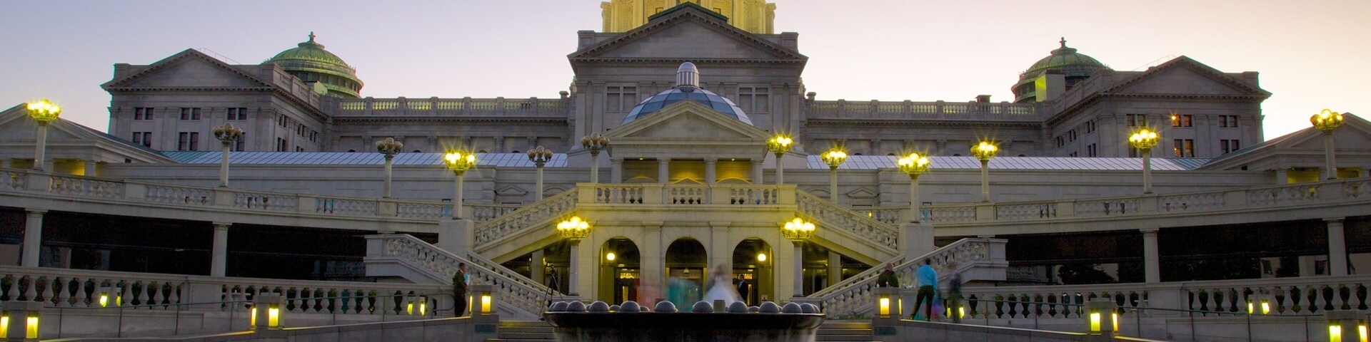Pennsylvania State Capitol which includes a fountain, a sunset and heritage architecture