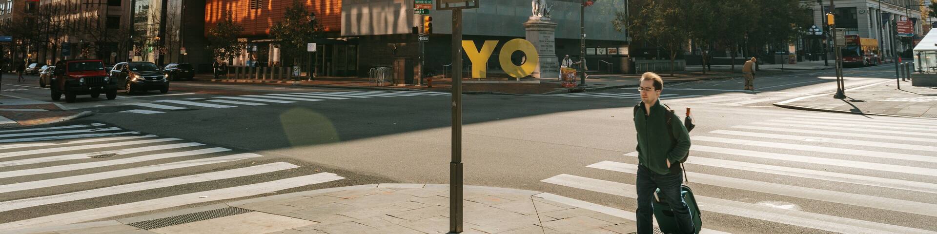 National Museum of American Jewish History featuring street scenes and a city as well as an individual male
