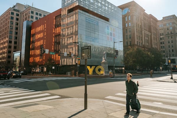 National Museum of American Jewish History featuring street scenes and a city as well as an individual male
