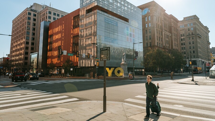 National Museum of American Jewish History featuring street scenes and a city as well as an individual male
