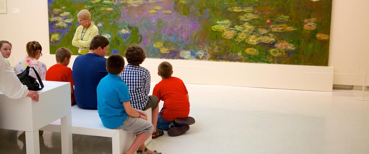 Carnegie Museum of Art showing art and interior views as well as a small group of people