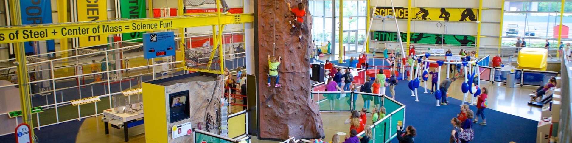 Carnegie Science Center showing interior views and climbing as well as a large group of people