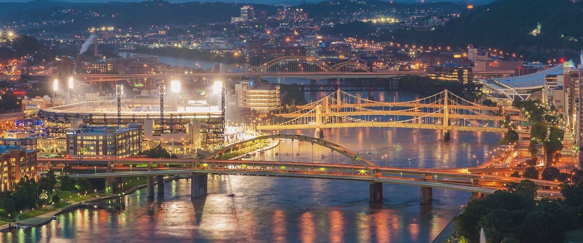 Point State Park which includes a river or creek, a city and night scenes