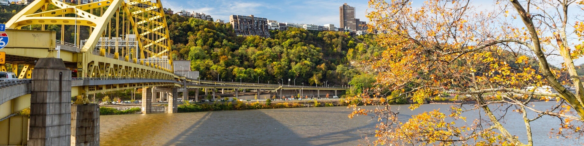 Point State Park which includes a bridge and a river or creek