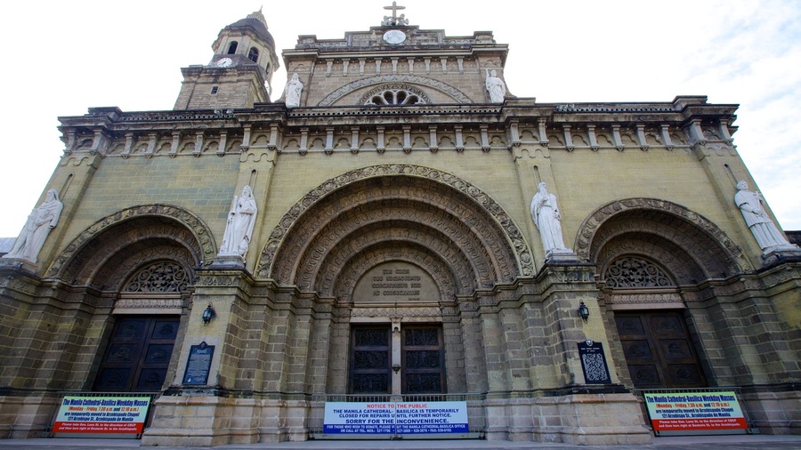 A historic cathedral with intricate stone carvings and statues.