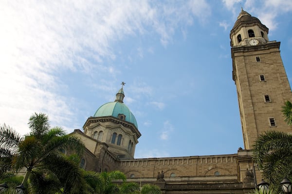Manila Cathedral which includes religious elements, a church or cathedral and heritage architecture