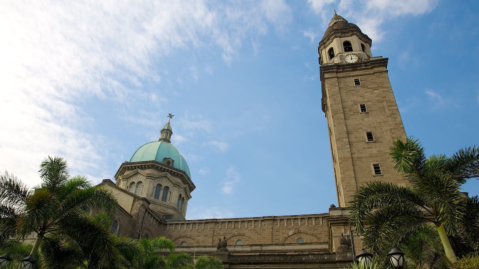Manila Cathedral which includes heritage architecture, a church or cathedral and religious elements