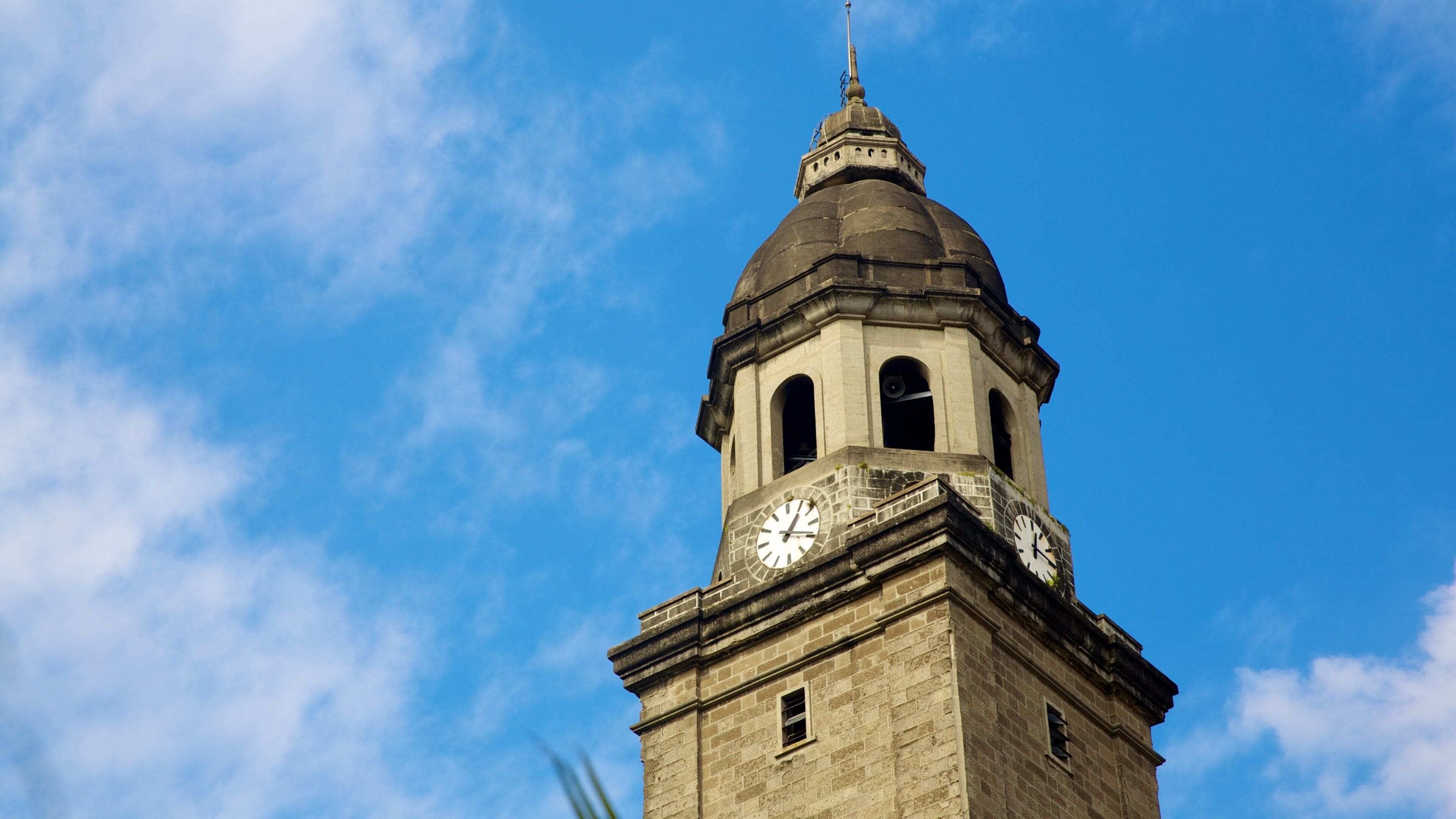 Manila Cathedral which includes heritage architecture, a church or cathedral and religious elements