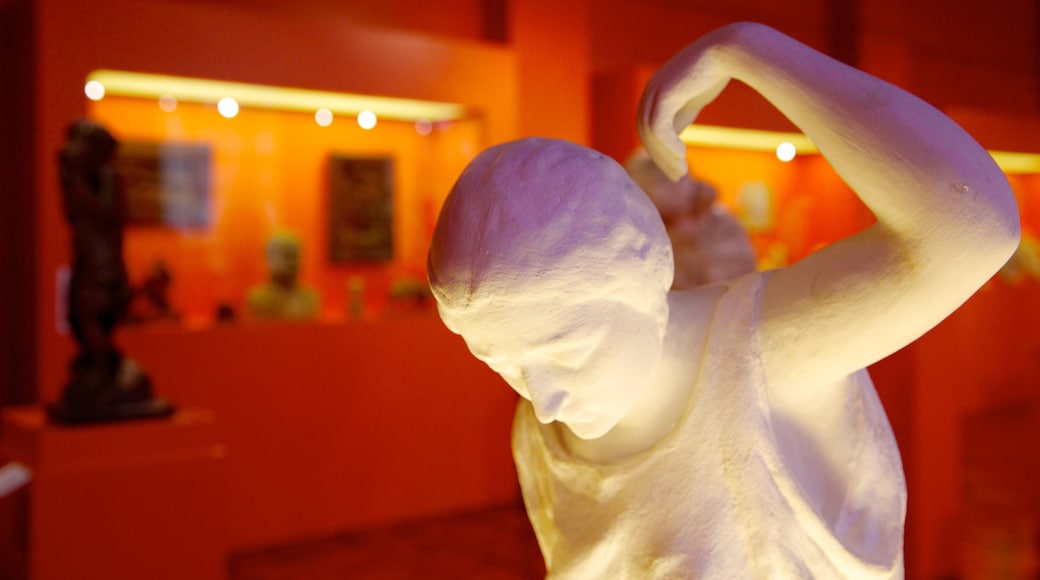 National Museum of the Filipino People which includes interior views, art and a statue or sculpture