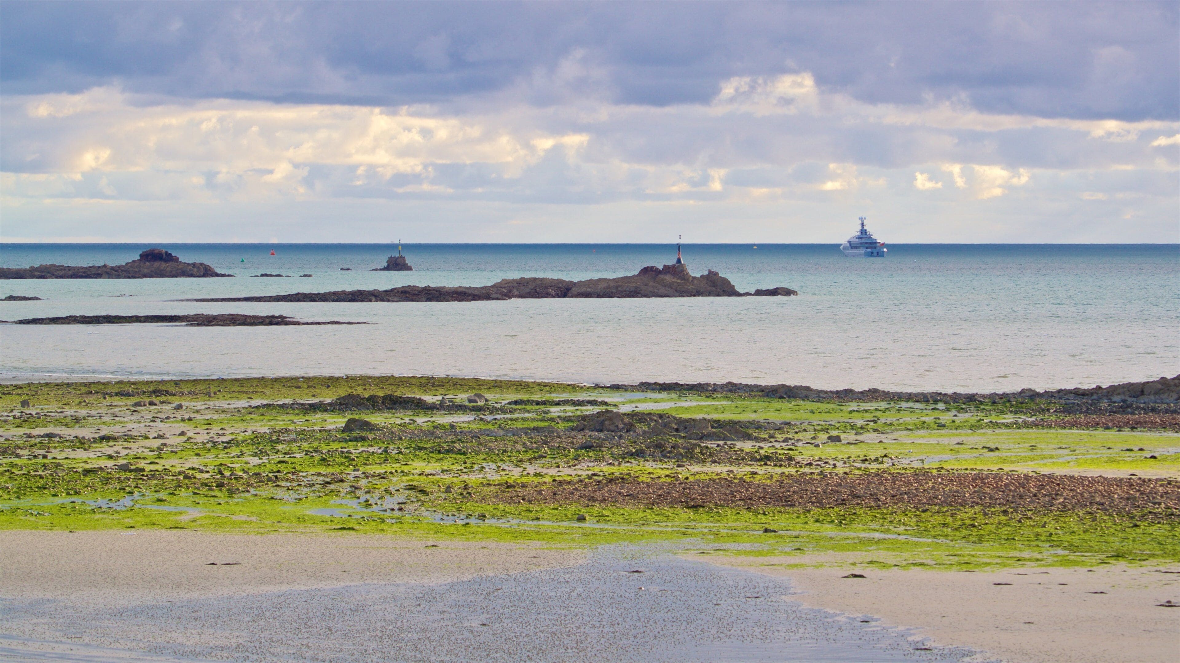 St. Helier Beach featuring general coastal views and cruising