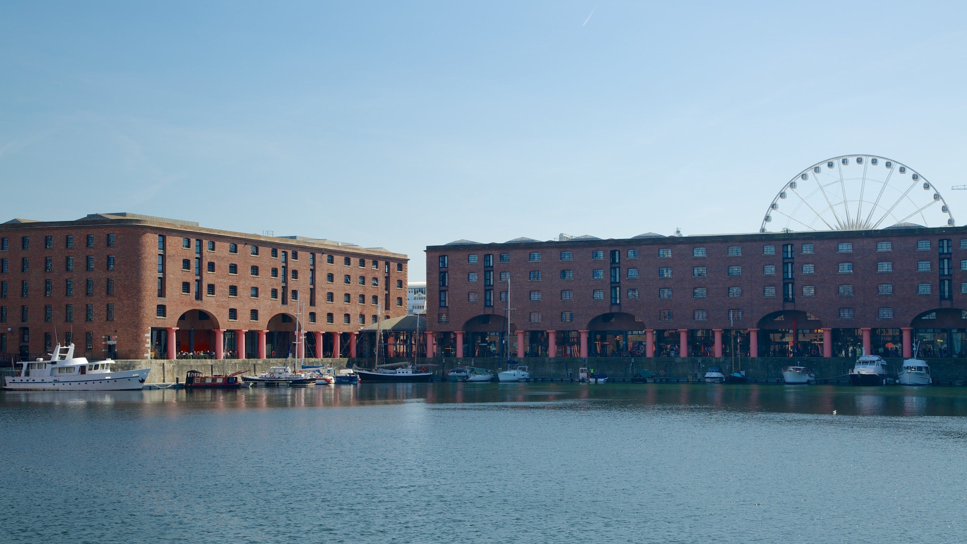 Albert Dock which includes a coastal town, heritage architecture and a bay or harbor