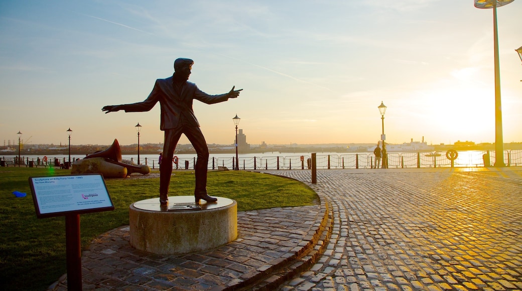 Royal Albert Dock which includes a coastal town, general coastal views and outdoor art