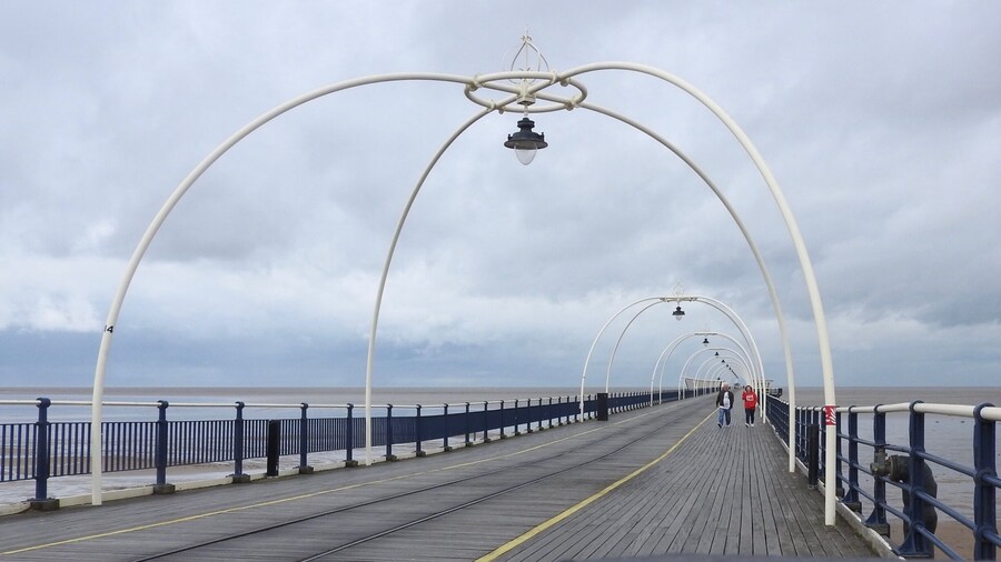 Southport Pier, first opened in August 1860, is the oldest iron pier in the country and spans a length of 1,108 metres (3,635 ft), making it the second-longest in Great Britain. Although at one stage reaching out 4,380 feet