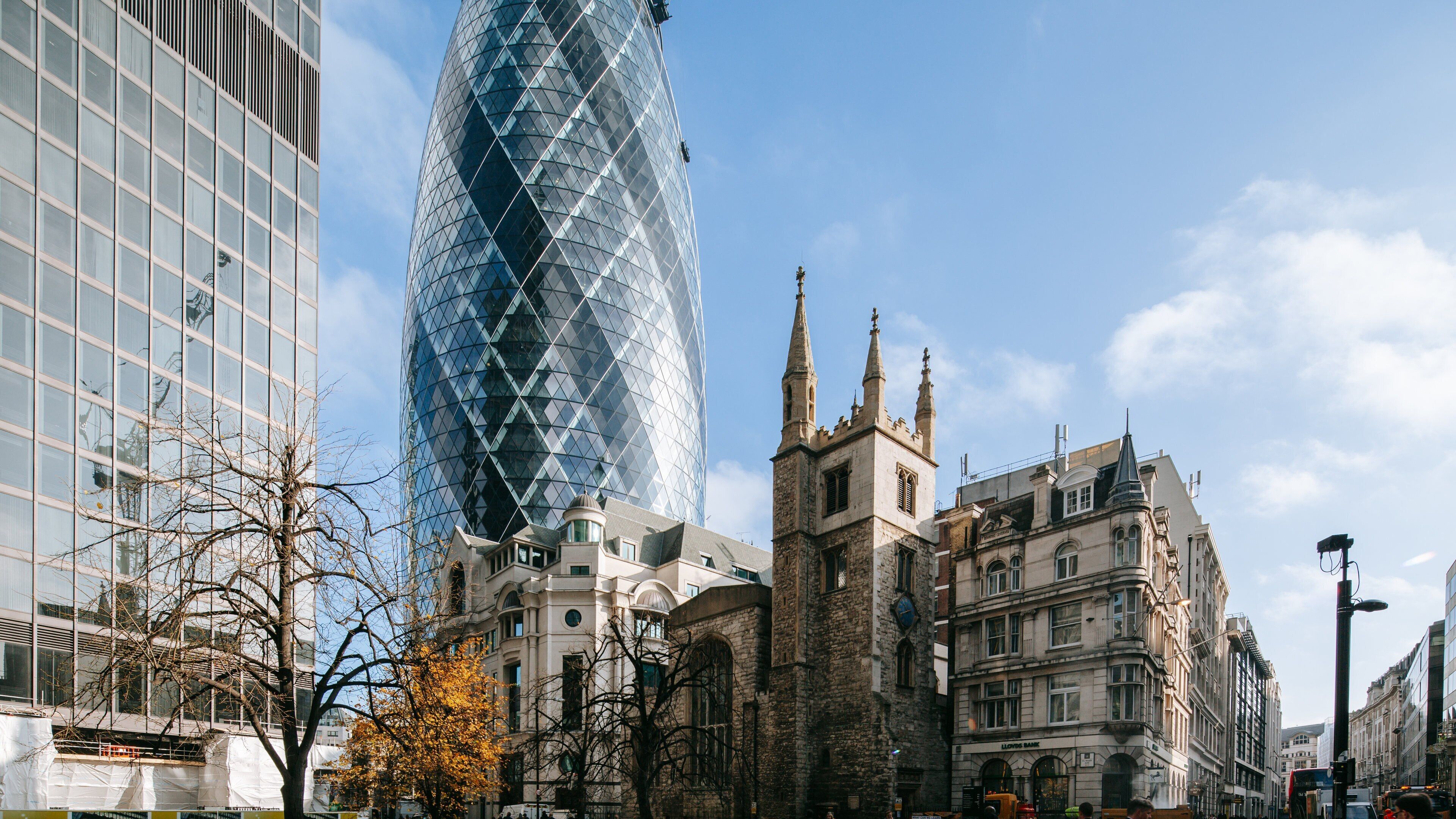 The Gherkin which includes a city, modern architecture and a skyscraper