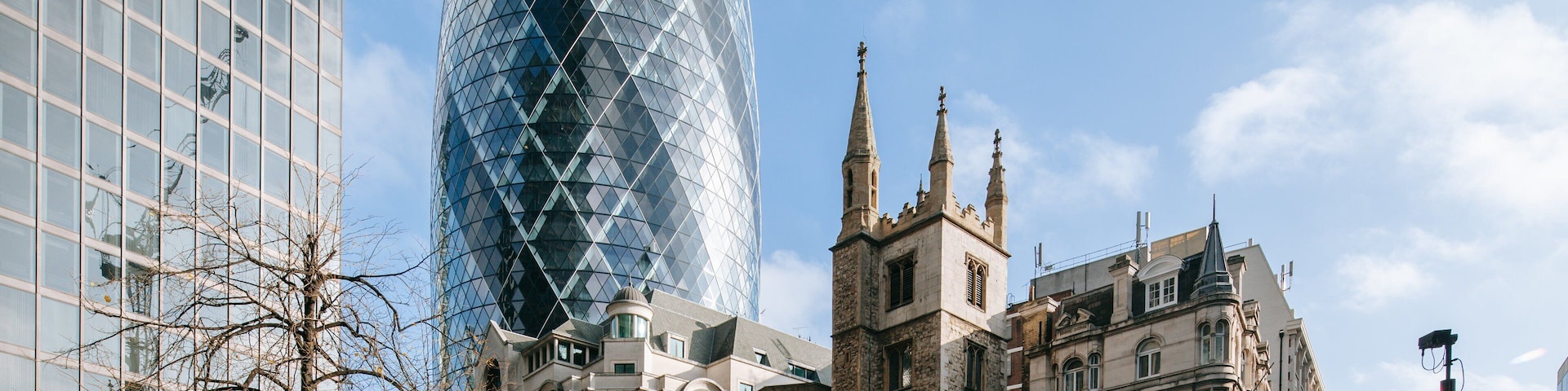 The Gherkin which includes a city, modern architecture and a skyscraper