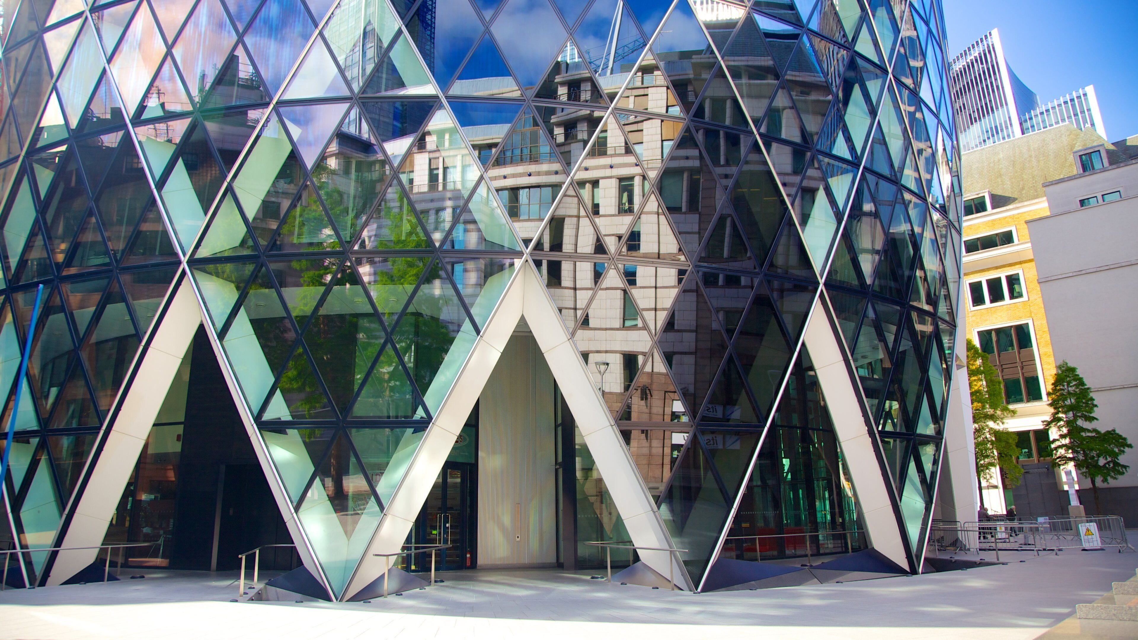 The Gherkin which includes modern architecture and city views