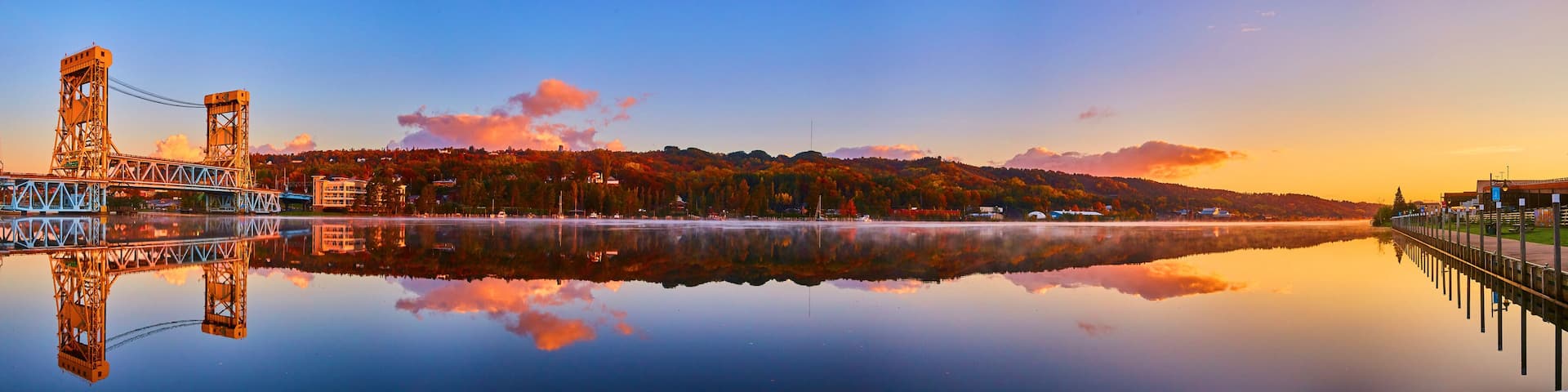 River Reflection Town with Bridge and Docks Sunrise Panorama
