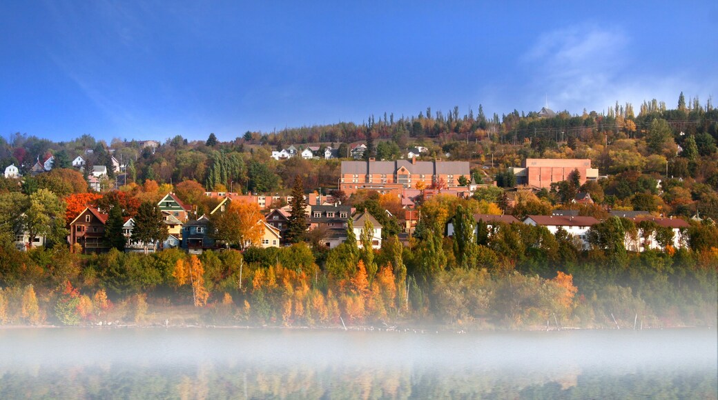 Morning fog on a river near Houghton city in Michigan
