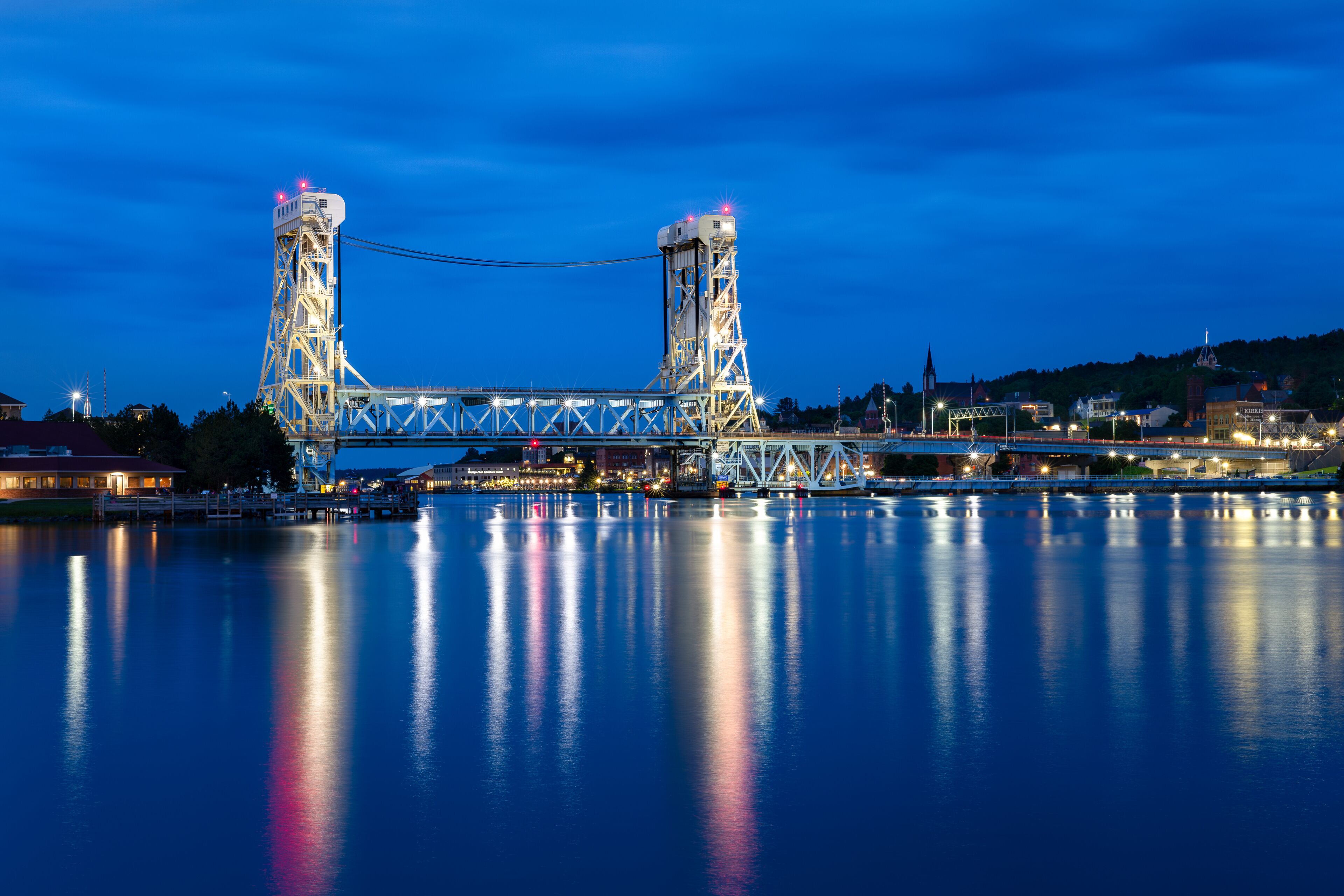 Lift Bridge at Night with Light Reflections on Water