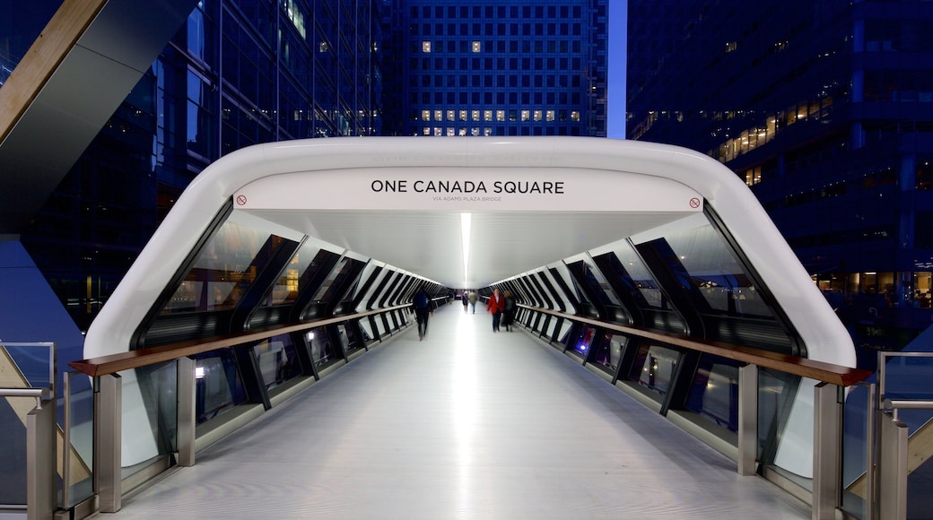 One Canada Square showing a city and night scenes