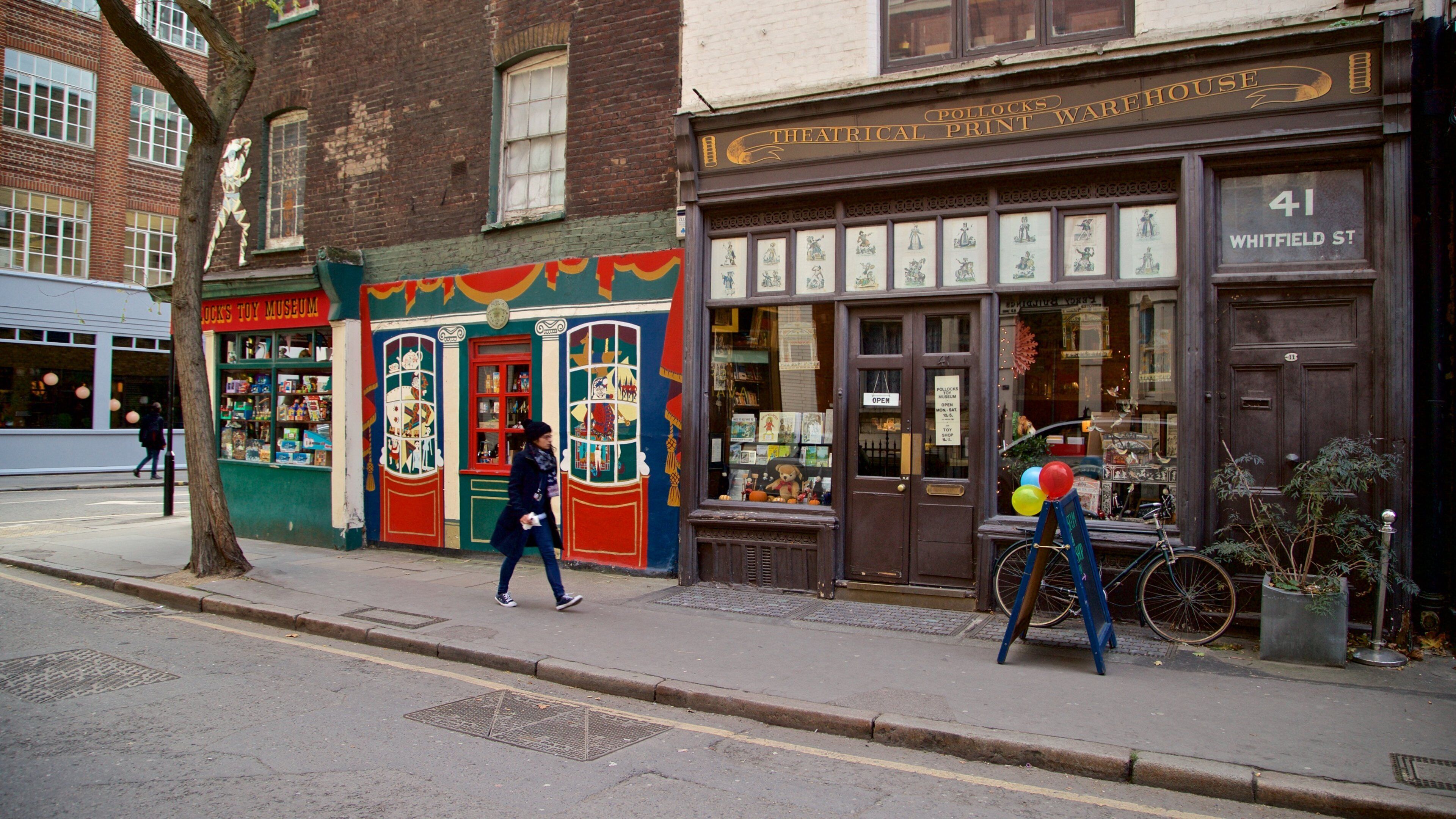 Pollock\'s Toy Museum featuring street scenes as well as an individual femail