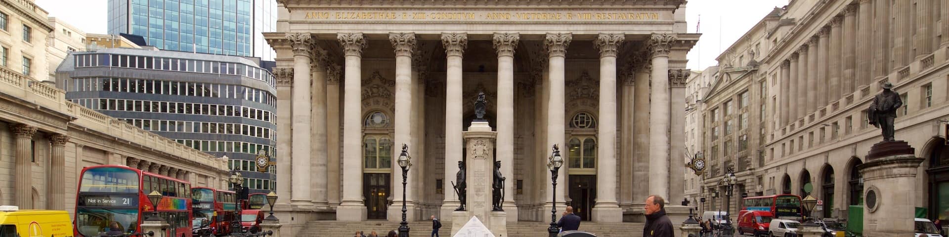 Royal Exchange showing a city, an administrative buidling and street scenes