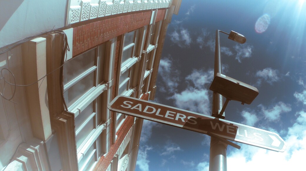 Low angle shot of the Sadlers Wells Theatre sign captured on a sunny day in London, UK