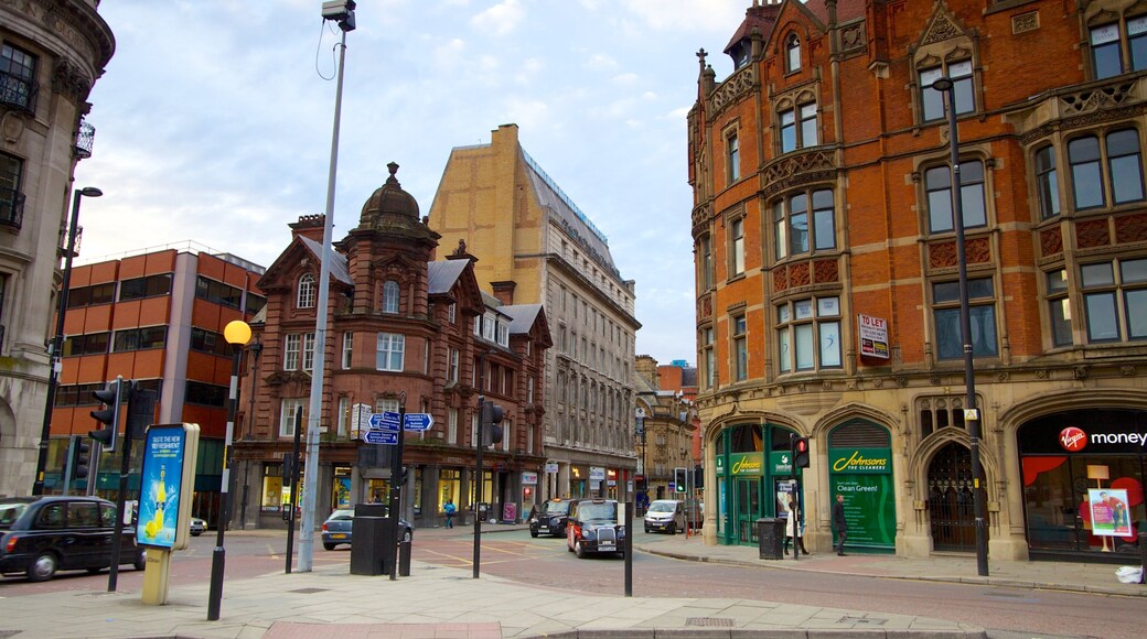 Albert Square which includes a square or plaza, a city and heritage architecture
