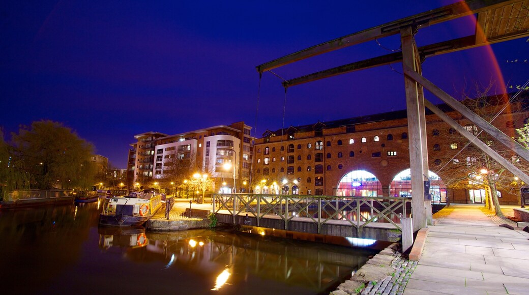 Castlefield Roman Fort featuring a bay or harbor, a bridge and night scenes