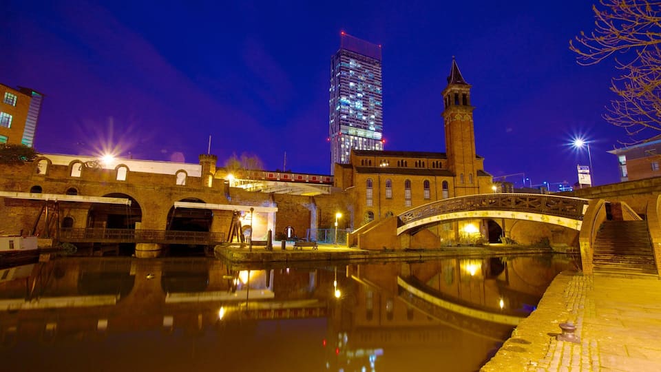 Castlefield Roman Fort showing night scenes, chateau or palace and a river or creek