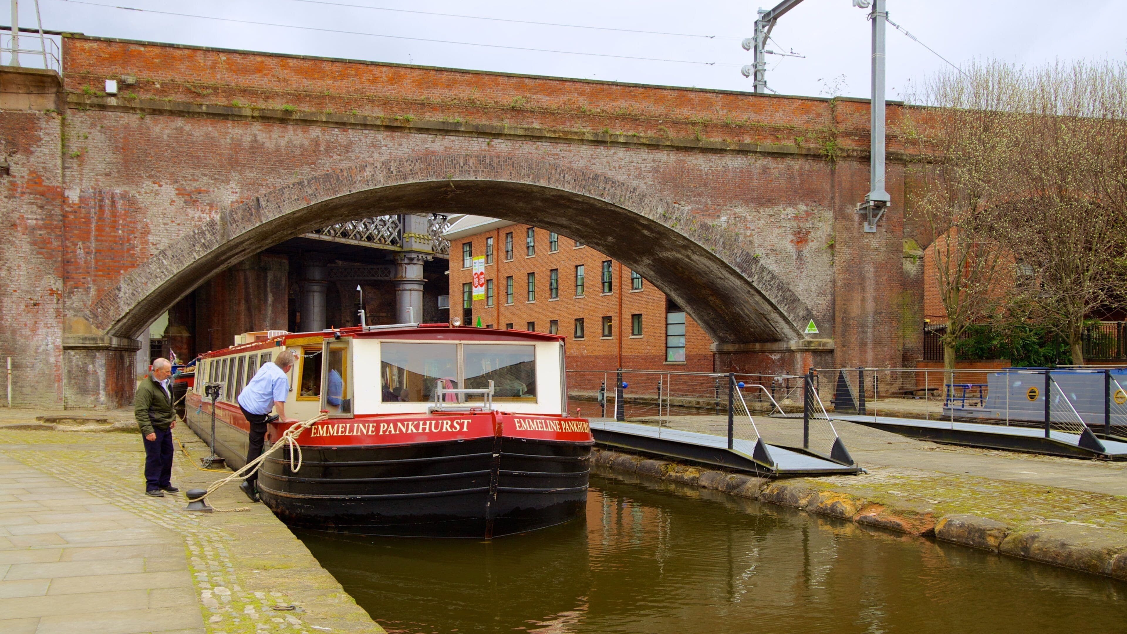 Castlefield Roman Fort which includes a river or creek, a small town or village and heritage architecture