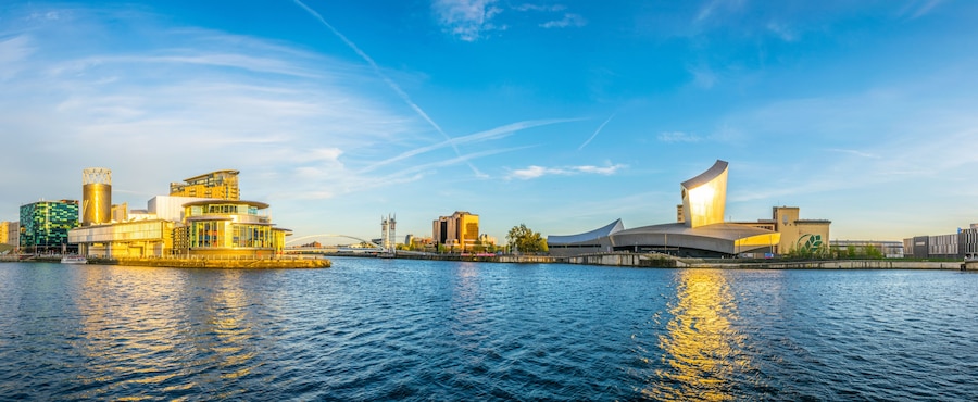 Imperial war museum North and the lowry theater in Manchesterduring sunset, England