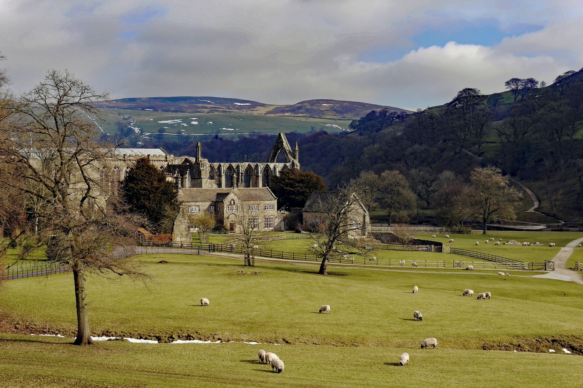 Another view.  Bolton Abbey is an estate in Wharfedale in North Yorkshire, England. It takes its name from the ruins of the 12th-century Augustinian monastery, shown here, which is now generally known as Bolton Priory.  The estate in the Yorkshire Dales is open to visitors, and includes many miles of all-weather walking routes.