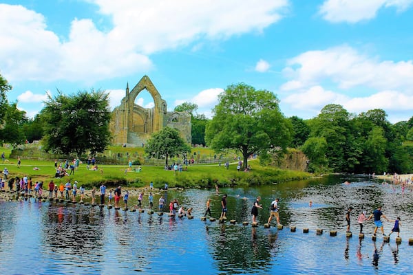 This is beautiful Bolton Abbey in Wharfedale at the foot of the Yorkshire Dales. The now ruined abbey was founded in 1154 but dissolved by Henry VIII in 1539. Dare to cross the sixty stepping stones to cross the river but beware of the Strid with its dangerous eddies of water.