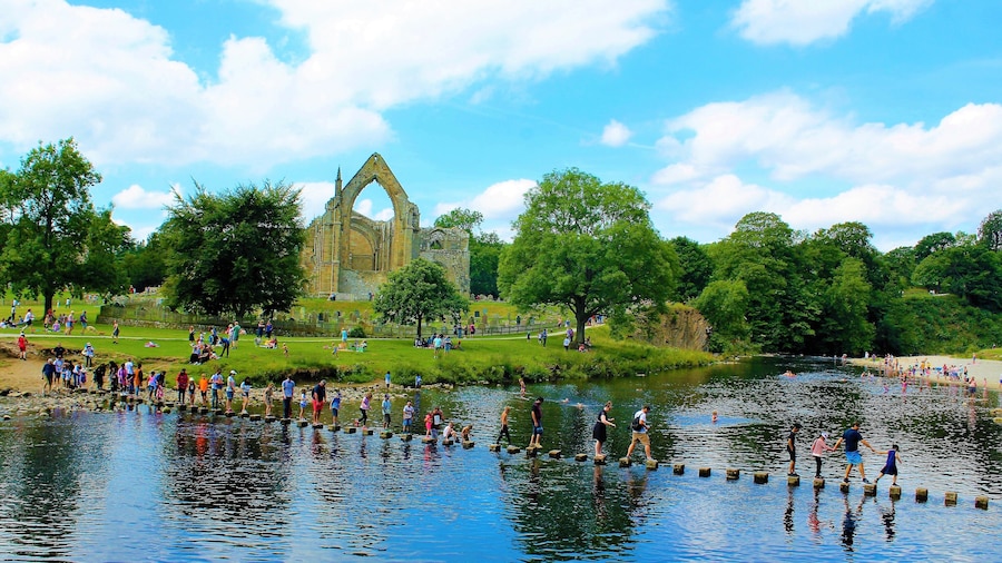 This is beautiful Bolton Abbey in Wharfedale at the foot of the Yorkshire Dales. The now ruined abbey was founded in 1154 but dissolved by Henry VIII in 1539. Dare to cross the sixty stepping stones to cross the river but beware of the Strid with its dangerous eddies of water.
