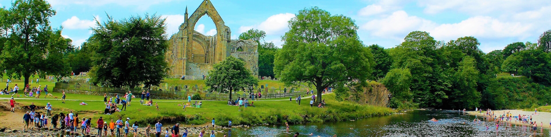 This is beautiful Bolton Abbey  in Wharfedale at the foot of the Yorkshire Dales. The now ruined abbey was founded in 1154 but dissolved by Henry VIII in 1539. Dare to cross the sixty stepping stones to cross the river but beware of the Strid with its dangerous eddies of water.