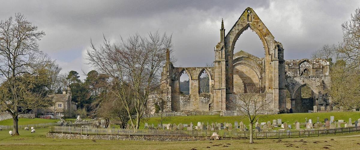 Bolton Abbey is an estate in Wharfedale in North Yorkshire, England. It takes its name from the ruins of the 12th-century Augustinian monastery, shown here, which is now generally known as Bolton Priory.
The estate in the Yorkshire Dales is open to visitors, and includes many miles of all-weather walking routes.