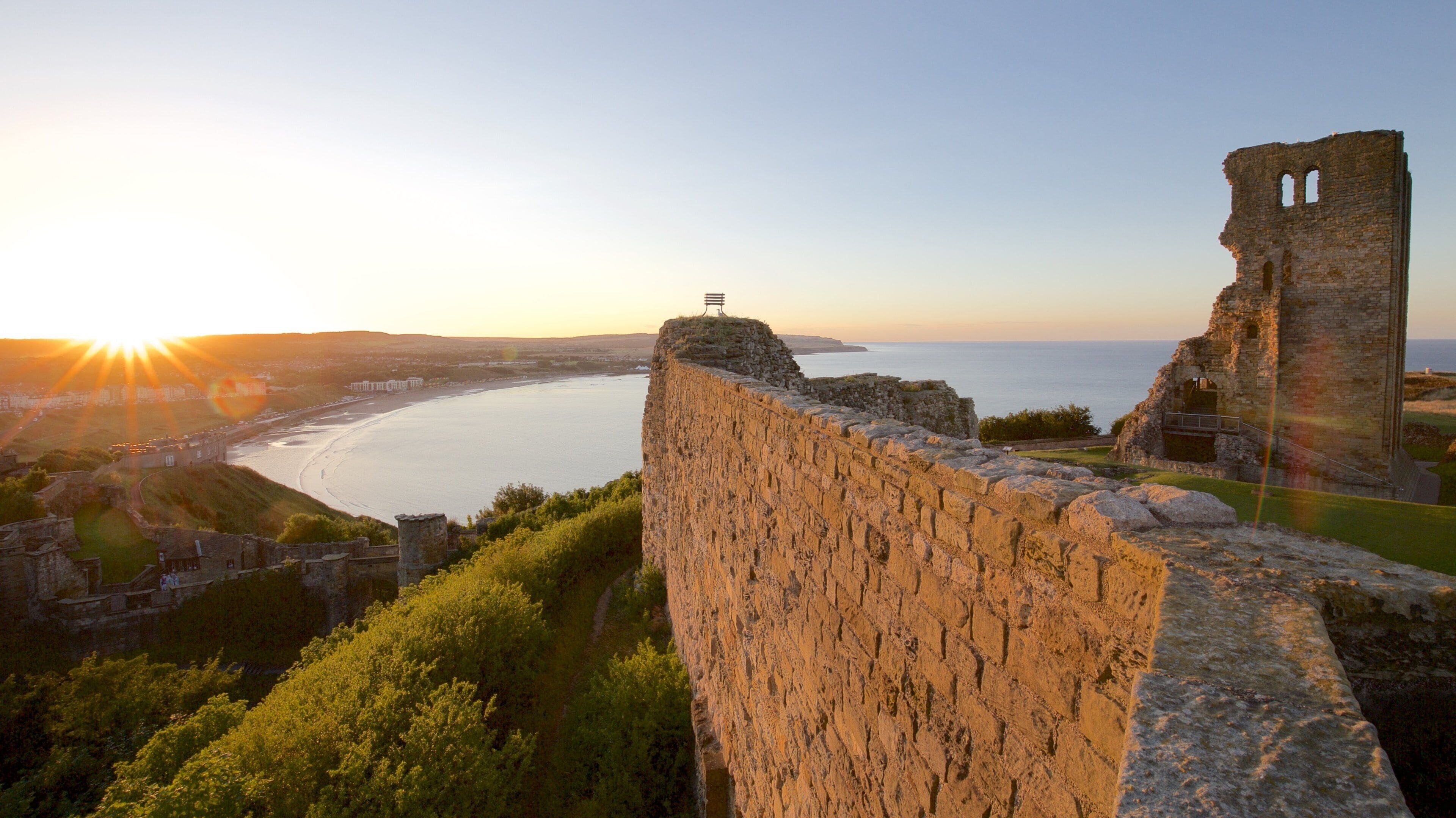 Scarborough Castle featuring a sunset, building ruins and a castle