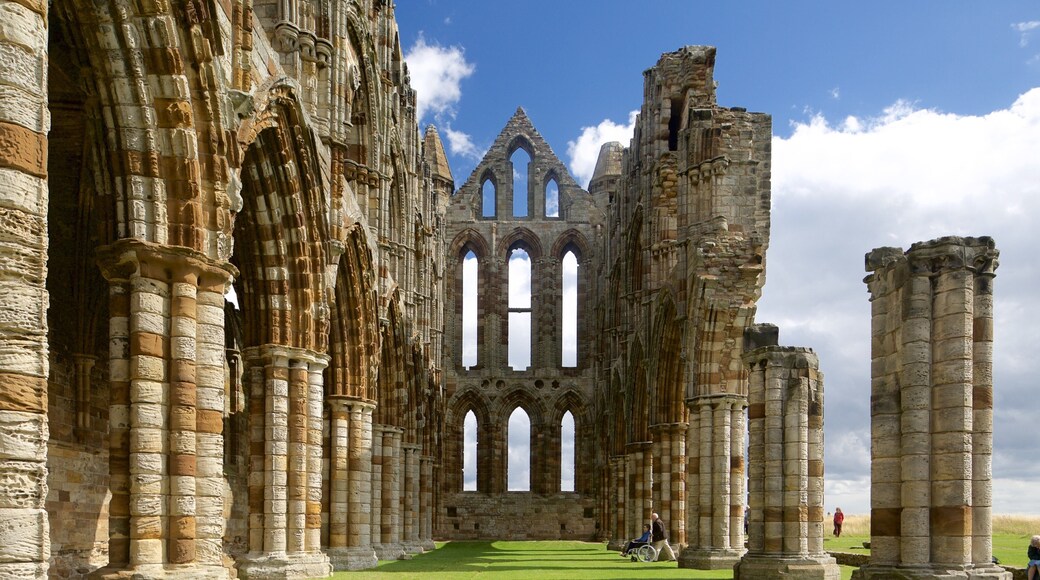 Whitby Abbey featuring heritage architecture and a church or cathedral