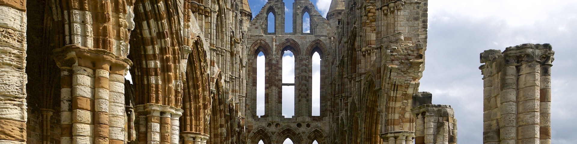 Whitby Abbey which includes heritage architecture and a church or cathedral