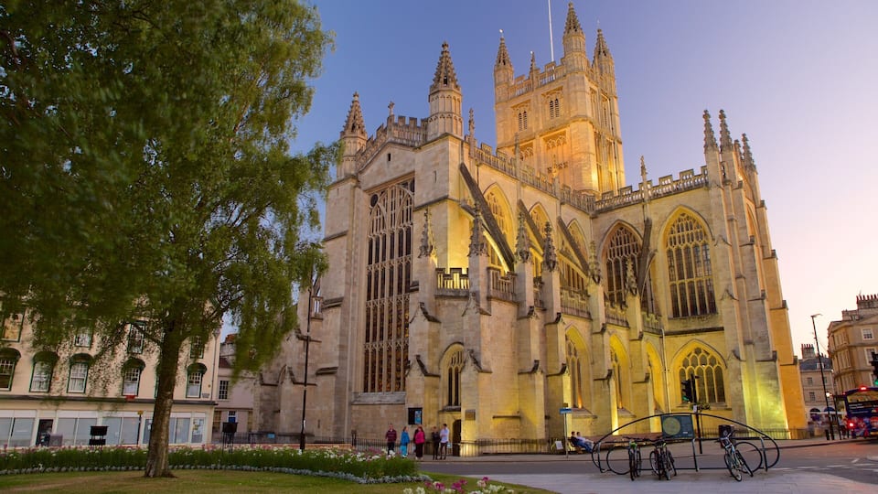 A historic cathedral with intricate Gothic architecture, including pointed arches and a large clock tower.