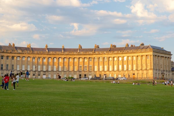 Royal Crescent showing an administrative building, a park and heritage architecture