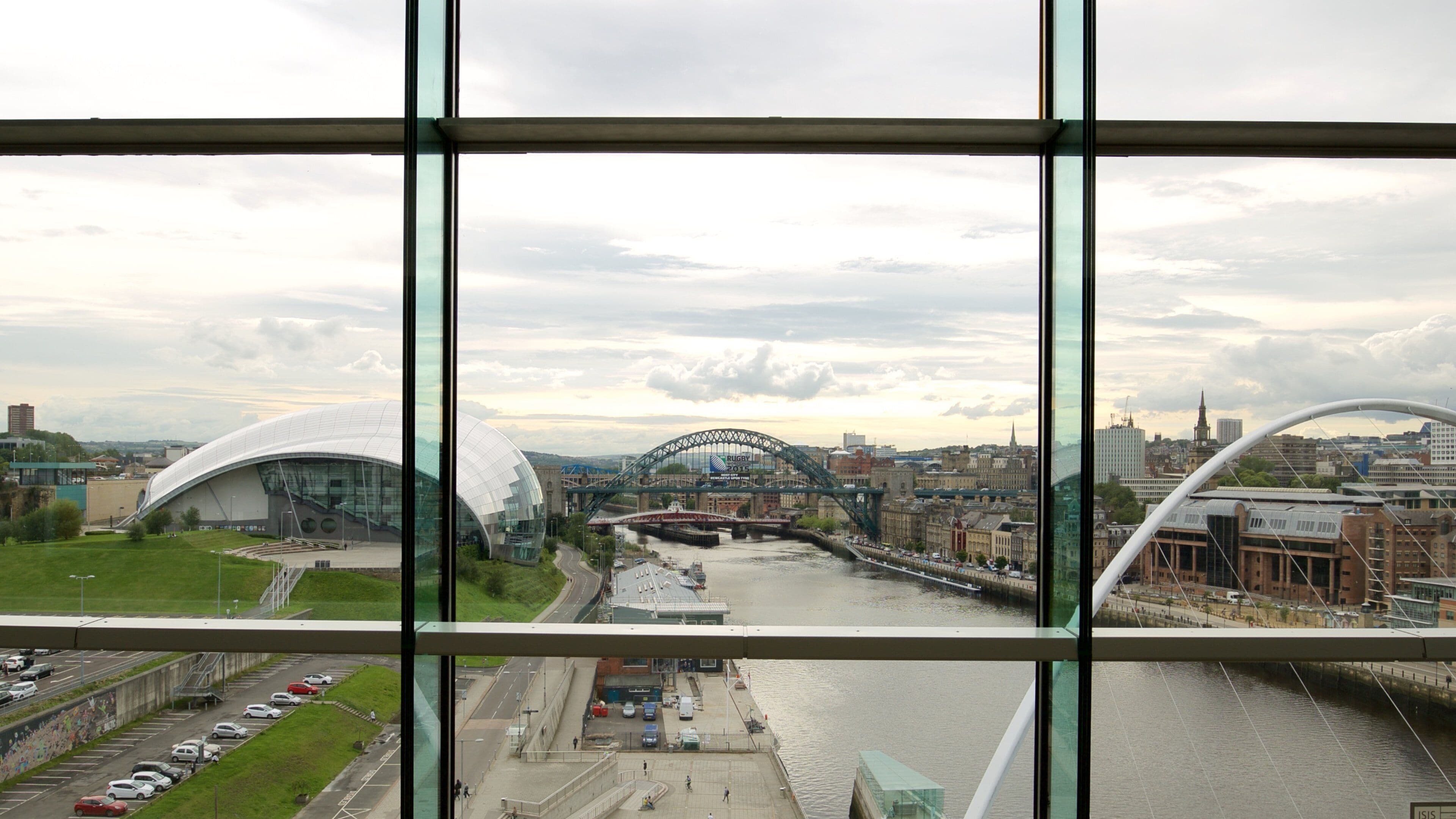 BALTIC Centre for Contemporary Art which includes a bridge, a river or creek and a city