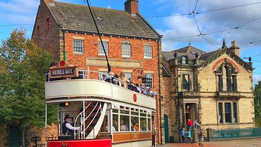 This is a great place to visit in the North of England.
It’s like stepping back in time to visit a town, farm, colliery village and old hall and getting to experience what it was like to live in those places from about 1910 onwards. There are staff who take on the roles of various locals that really bring this place to life.
This picture is from the town where you can explore a bank, shops, pub, dentists and lots of other things as well as ride in traditional vehicles of the time. Such a brilliant experience.