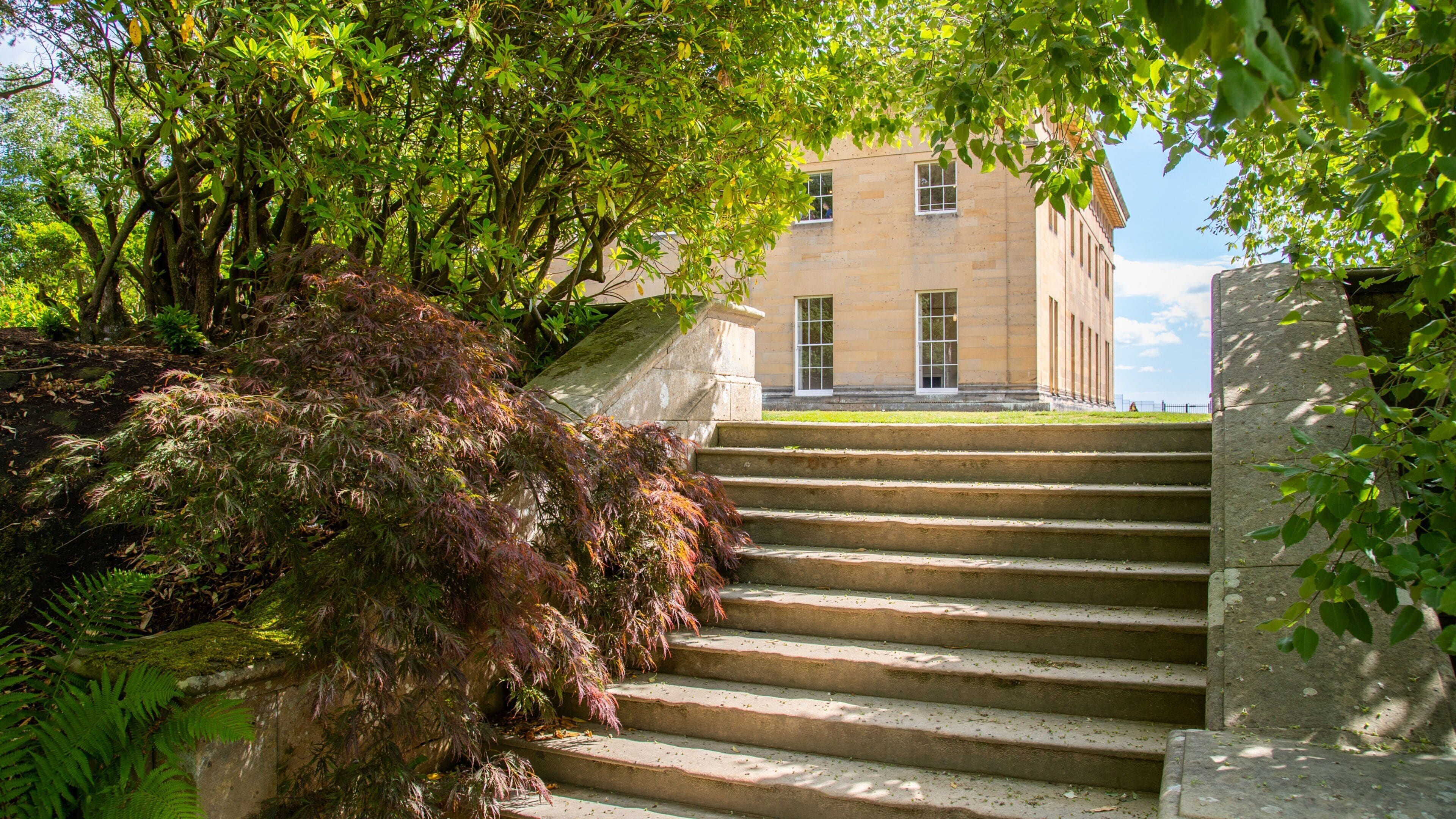Belsay Hall, Castle and Gardens featuring a park
