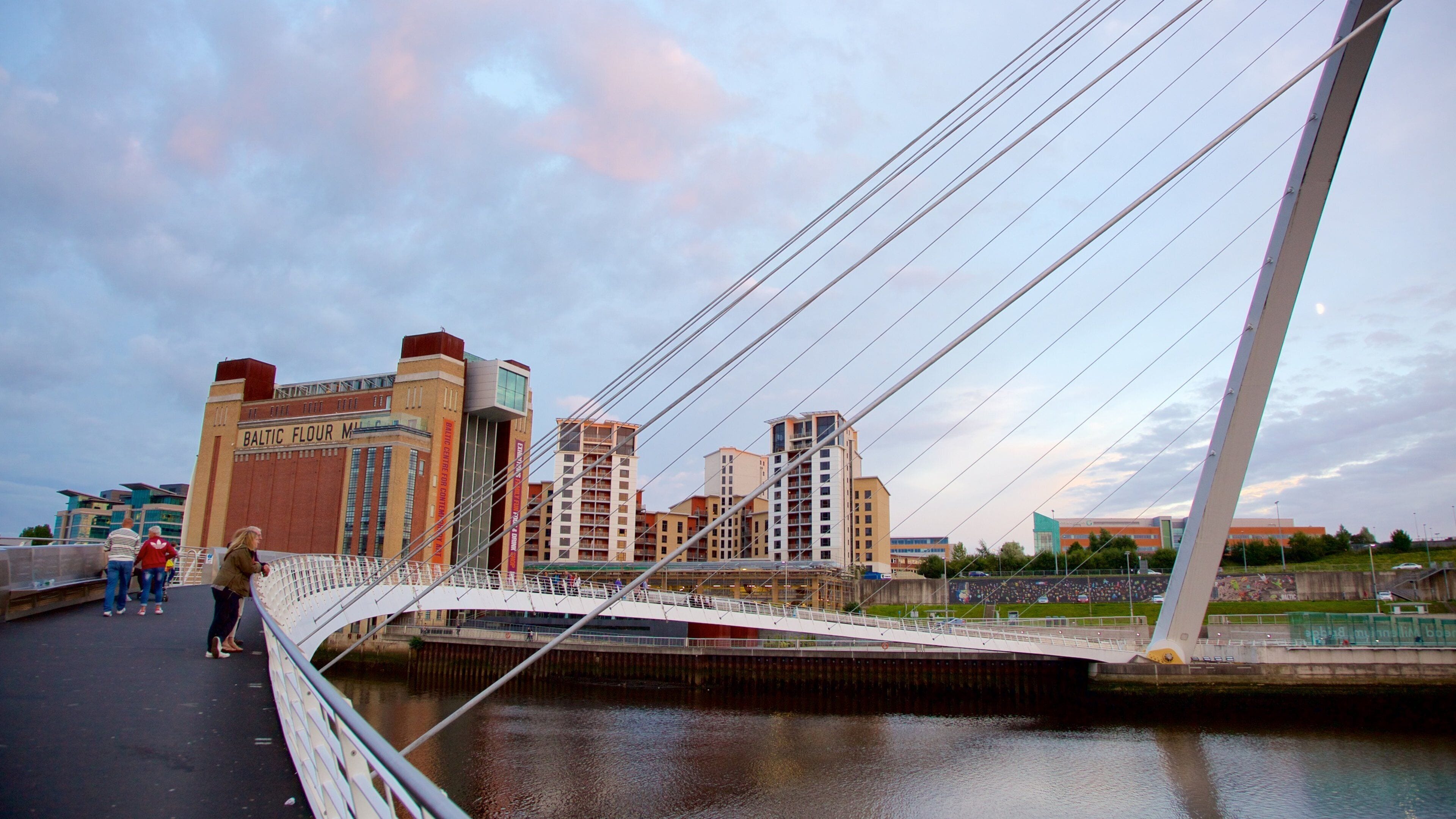 Gateshead Millennium Bridge showing views, a bridge and a river or creek