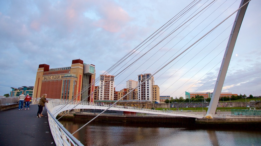 Gateshead Millennium Bridge showing a river or creek, modern architecture and a bridge