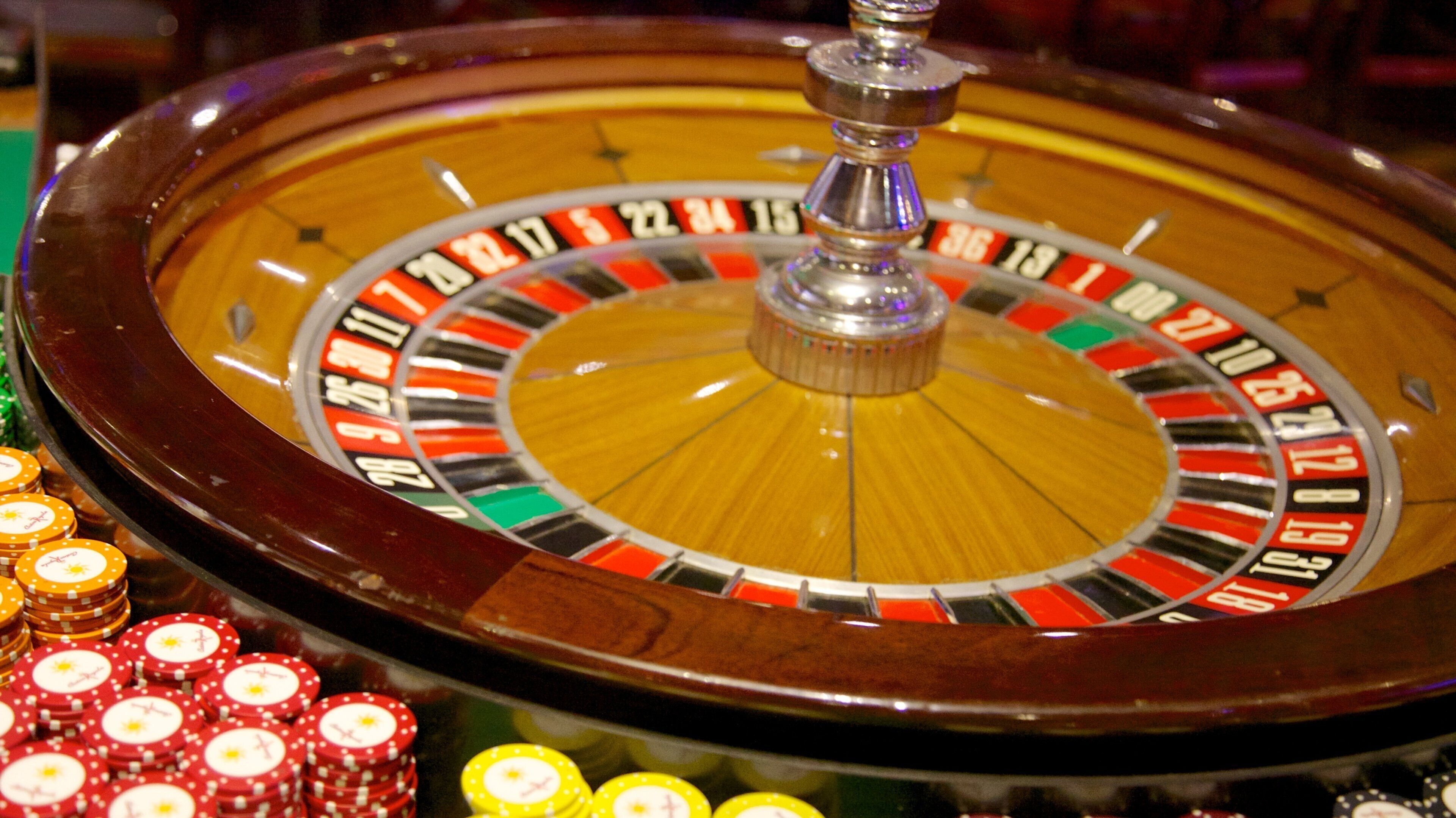 Casino Royale which includes a casino and interior views