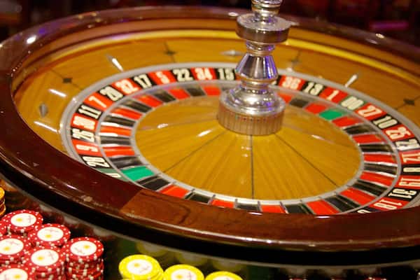 Casino Royale which includes a casino and interior views