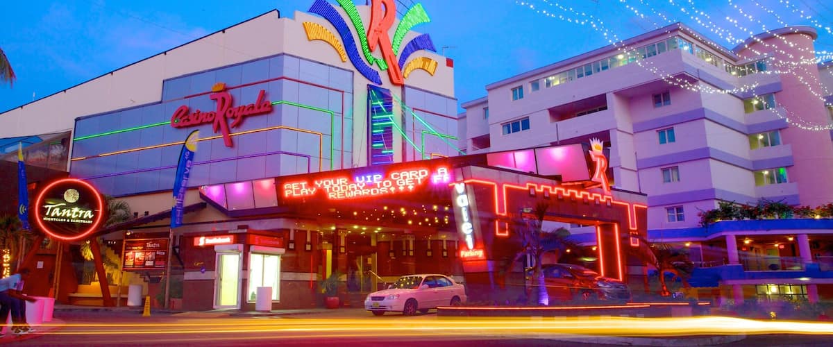 Casino Royale which includes night scenes, a casino and signage